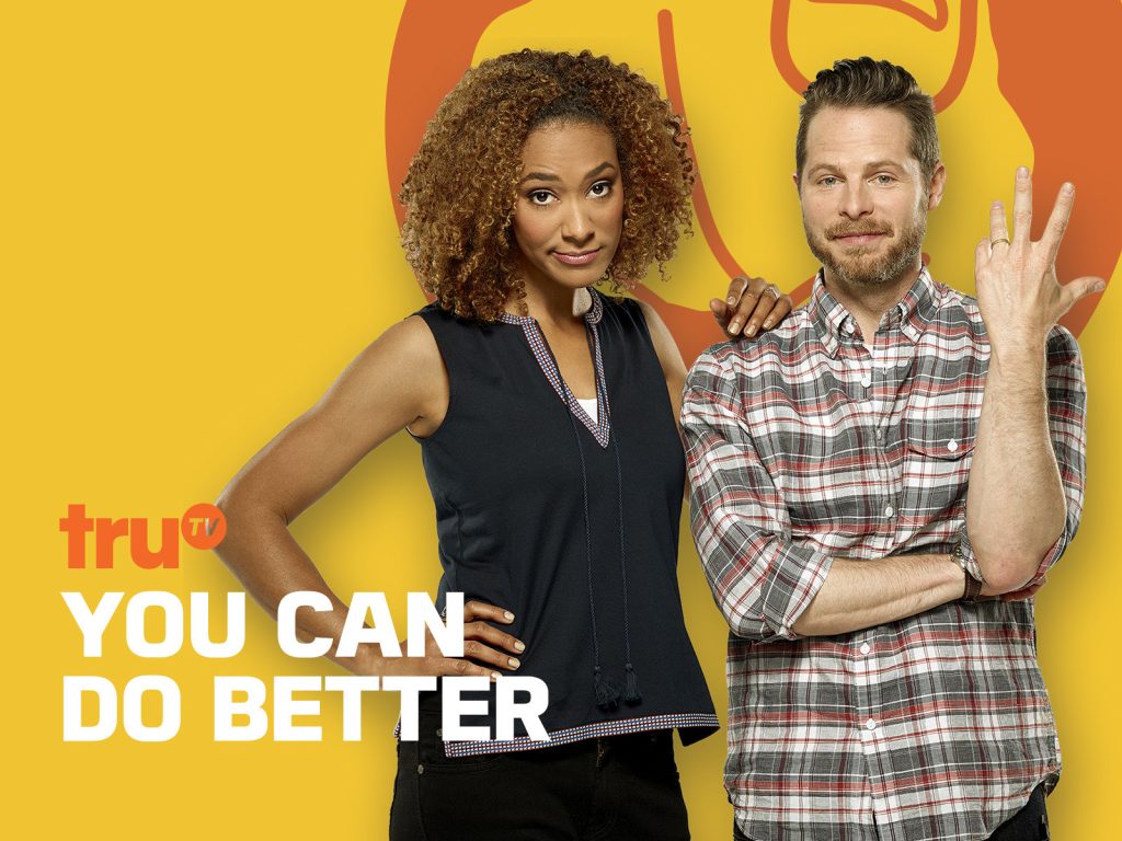 Two hosts pose against a bright yellow and orange TruTV promotional background for “You Can Do Better.” The woman (Abbi Crutchfield) stands with one hand on her hip, while the man (Matthew Latkiewicz) stands beside her with his arms crossed, raising one hand to show four fingers. Large white text reads “YOU CAN DO BETTER,” with the orange TruTV logo above it.