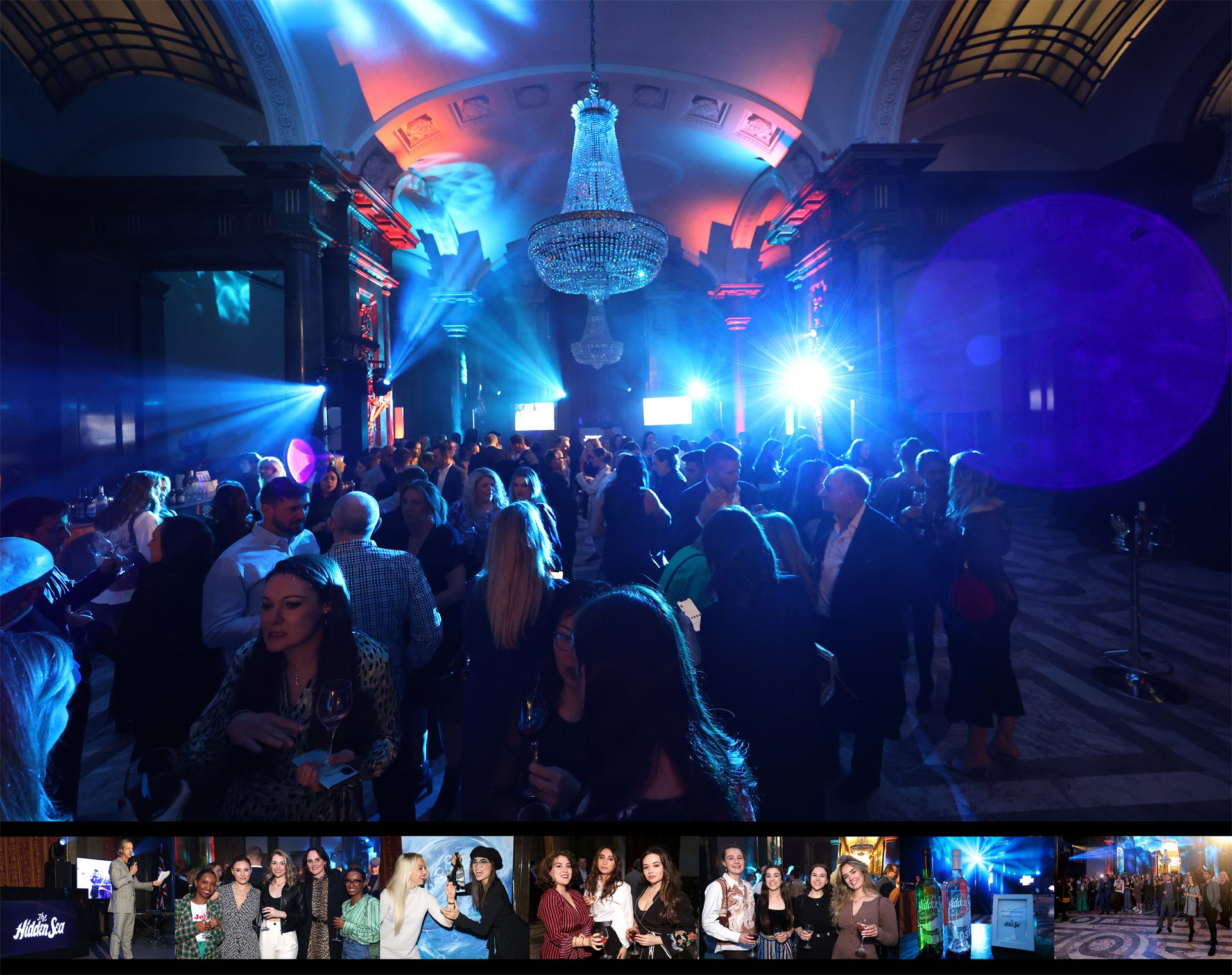 Guests mingle beneath dramatic blue and magenta lighting in the grand ballroom of Australia House in London during The Hidden Sea’s immersive brand event celebrating 10 million plastic bottles removed from the ocean. A chandelier hangs above the crowd, with smaller event photos displayed in a strip along the bottom.